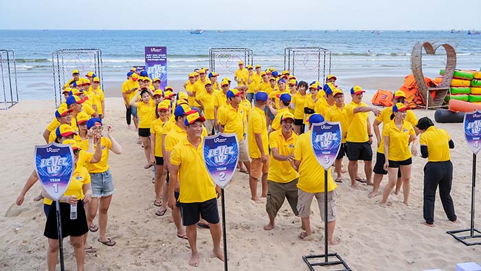 áo polo đồng phục team building màu vàng