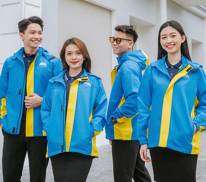 may áo khoác gió đồng phục màu xanh phối vàng