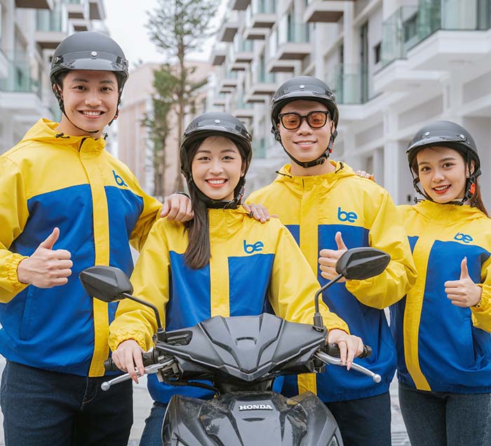 may áo khoác gió đồng phục màu xanh phối vàng