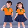 đồng phục mầm non và tiểu học cổ tròn màu cam viền xanh két