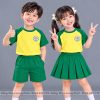 đồng phục mầm non và tiểu học cổ tròn màu màu vàng phối xanh két