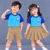 đồng phục mầm non và tiểu học cổ tròn màu xanh ya phối xanh bích