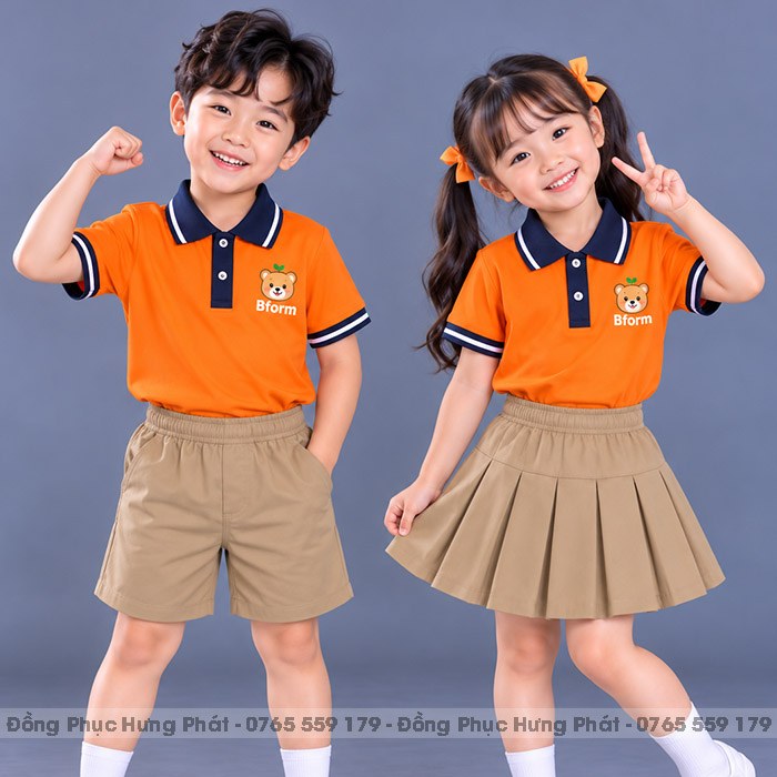 đồng phục mầm non và tiểu học polo màu cam viền xanh đen