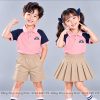 đồng phục mầm non và tiểu học polo màu hồng phối xanh đen