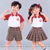 đồng phục mầm non và tiểu học polo màu trắng phối đỏ